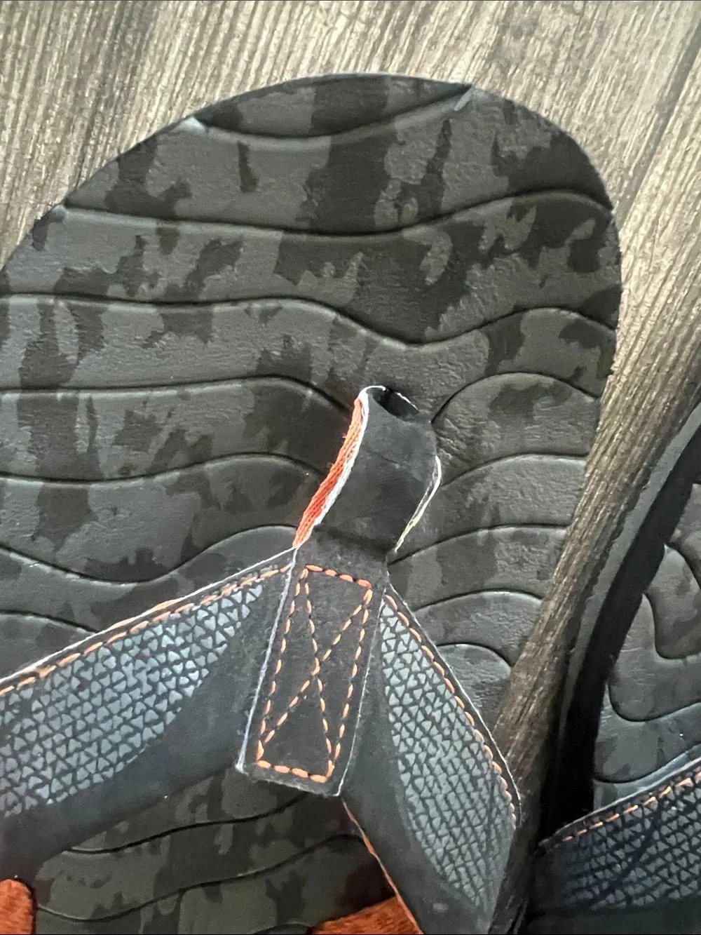 Reef Roundhouse Flip Flops in orange and black